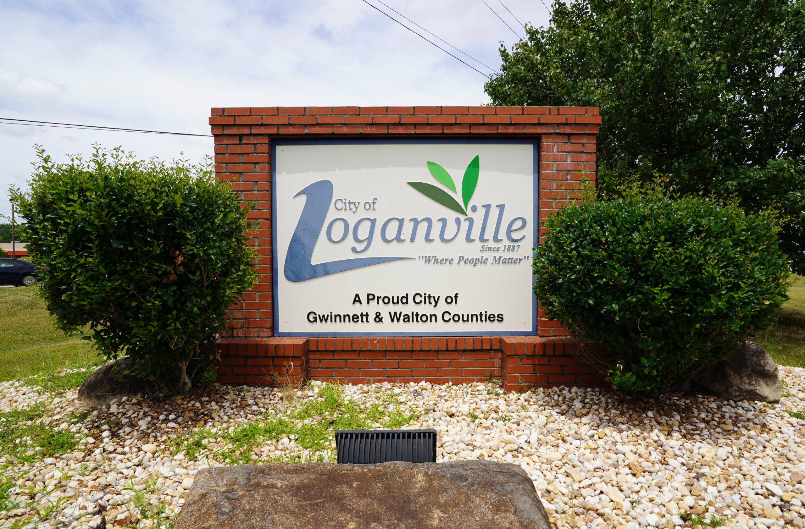 A sign for Loganville, Georgia's welcome landmark